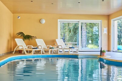 Spacious two-storey villa with heated indoor pool, sauna and large garden