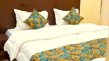 Deluxe Double Room, Air conditioning, City View | Rollaway beds, bed sheets