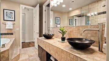 Shower, hair dryer, towels, shampoo