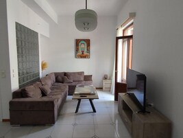 Family Apartment, Balcony | Living area | Flat-screen TV