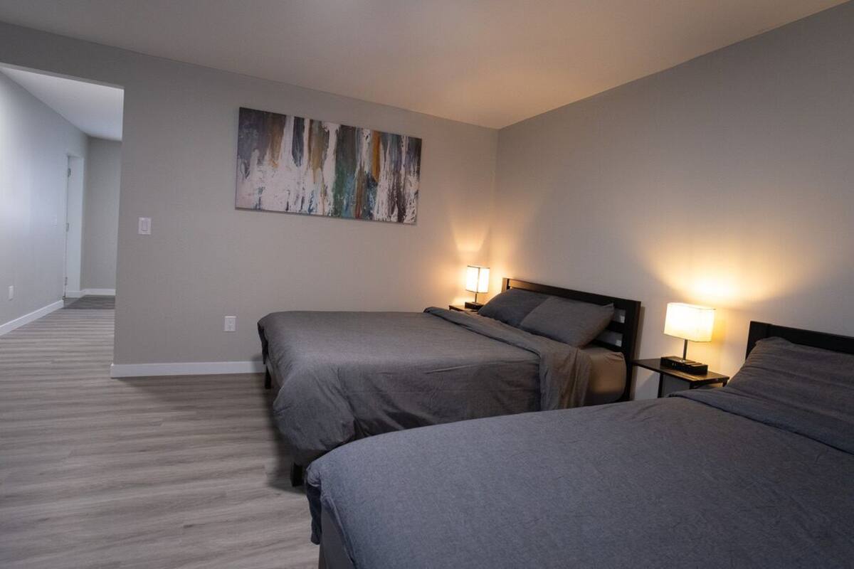 Habitación cuádruple ejecutiva, para no fumadores | Escritorio, espacio para trabajar con laptop y wifi gratis