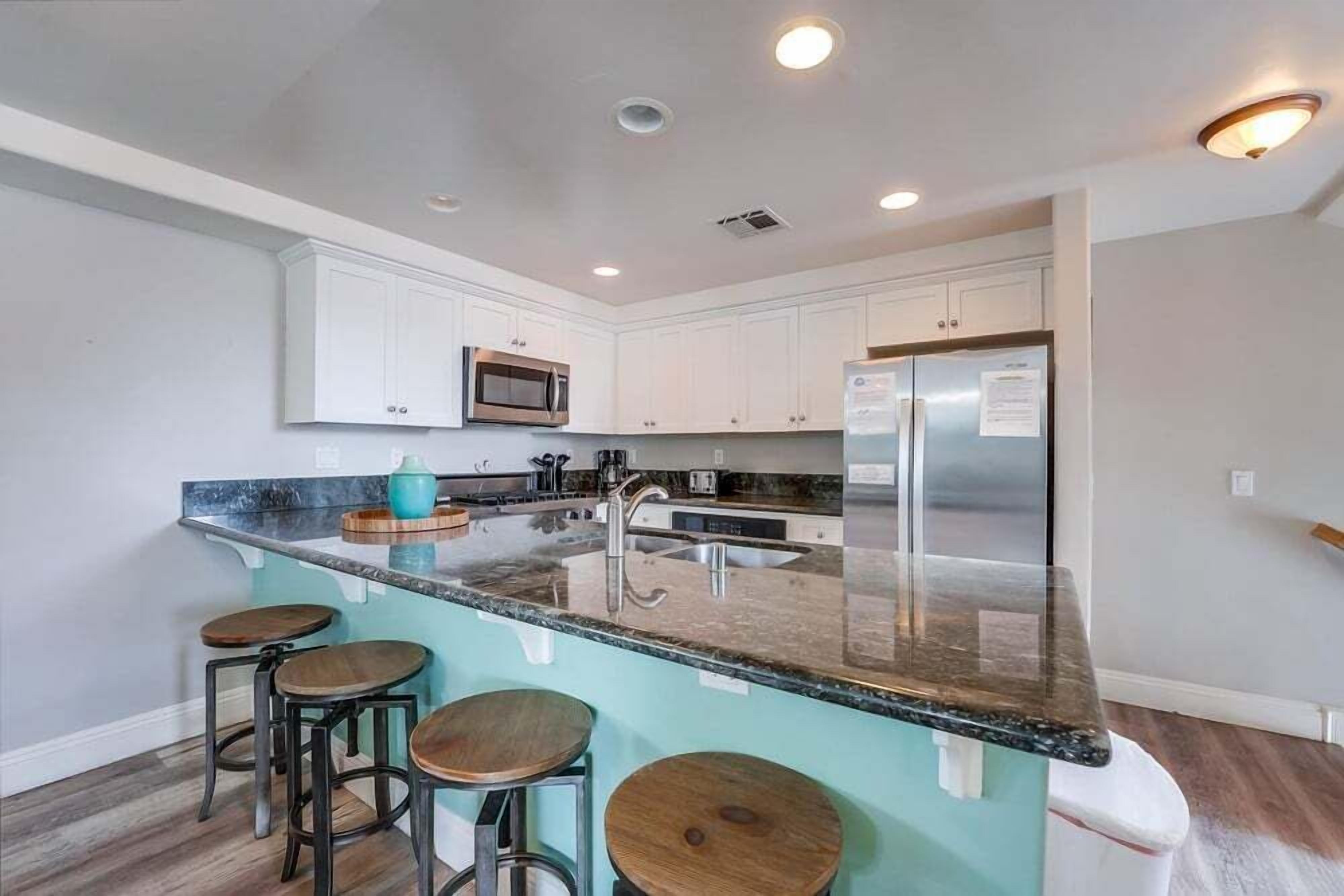 Apartamento, várias camas, varanda, vista para a cidade | Cozinha privada | Cafeteira/chaleira