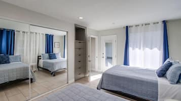 Apartment, Multiple Beds, Patio, Partial Ocean View | 4 bedrooms, individually decorated, individually furnished