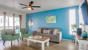 Apartment, Multiple Beds, Balcony, Partial Ocean View | Living area