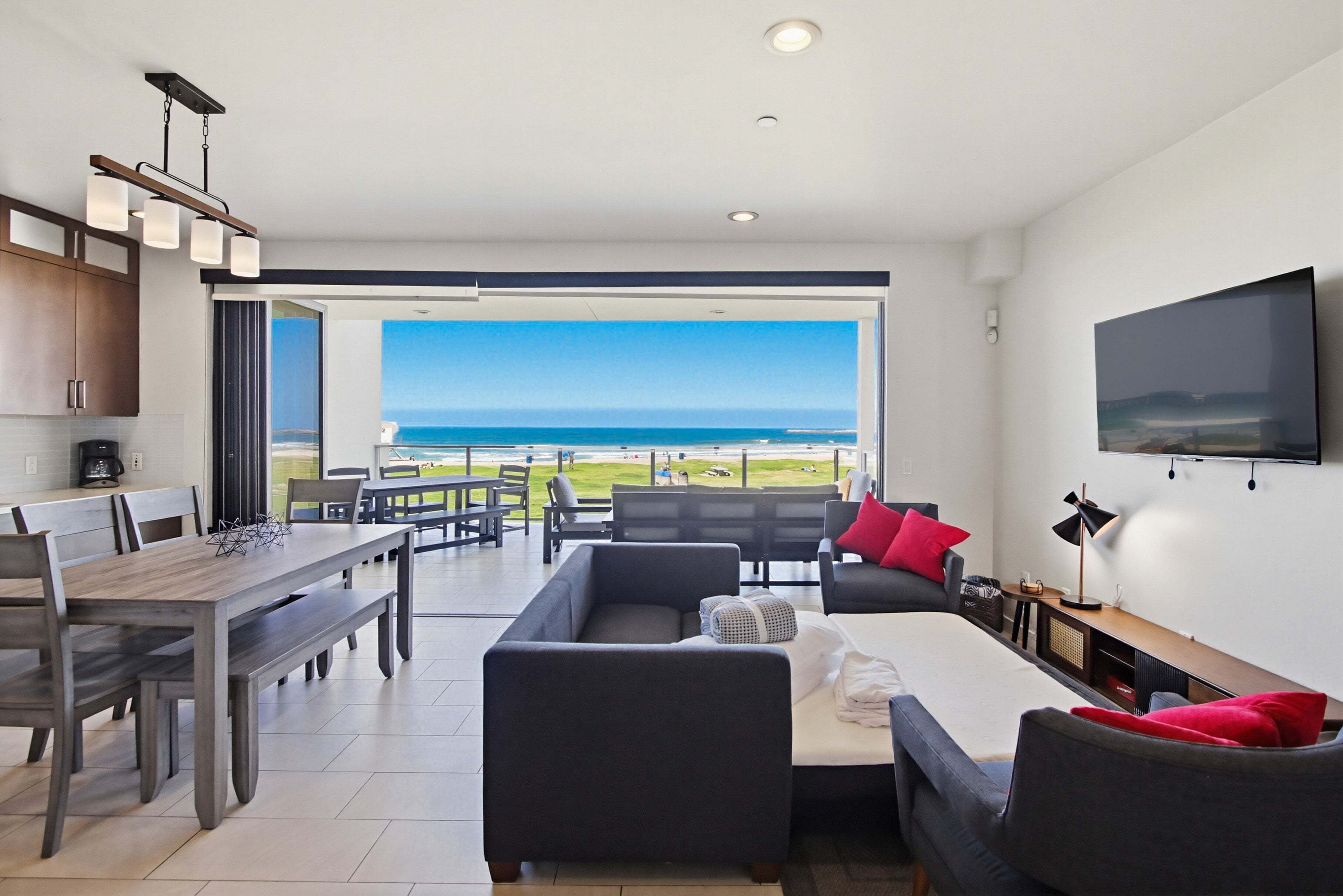 Apartment, Mehrere Betten, Balkon, Meerblick | Wohnbereich