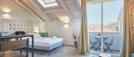 Lägenhet (1 Bedroom) | 1 sovrum, skrivbord, strykjärn/strykbräda och barnsängar