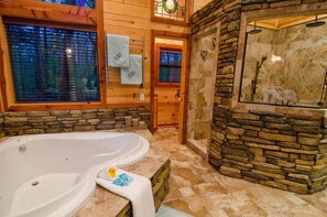 Shower, jetted tub, towels