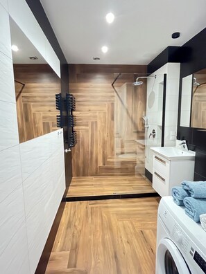 Shower, hair dryer, towels, soap