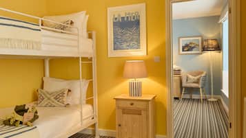 Habitación cuádruple Deluxe | Ropa de cama hipoalergénica, wifi gratis y ropa de cama
