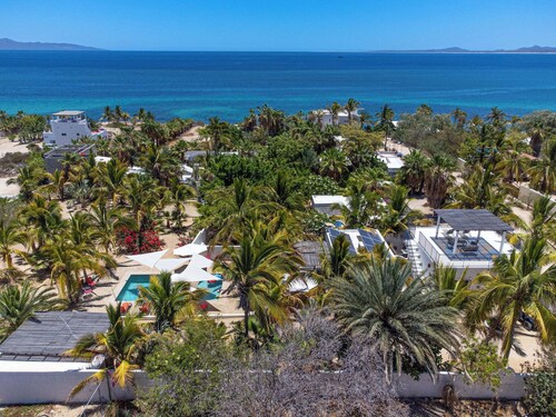 A Beautiful private Beach House w/ Large Pool, surrounded By Palms & Flowers