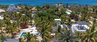 A Beautiful private Beach House w/ Large Pool, surrounded By Palms & Flowers