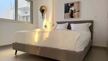 2 dormitorios, tabla de planchar con plancha, wifi y ropa de cama