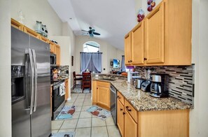 House, Multiple Beds (112 CA - 4BR Mickey's Tranquil Haven ) | Private kitchen - 112 CA - 4BR Mickey's Tranquil Haven at Solana Resort (Davenport)