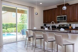 House, Multiple Beds (421 NP - Exquisite Retreat at Encore ) | Private kitchen | Full-size fridge, dishwasher, electric kettle, toaster