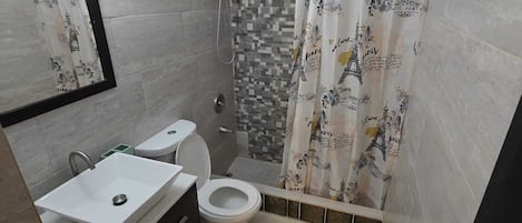 Shower, towels, toilet paper
