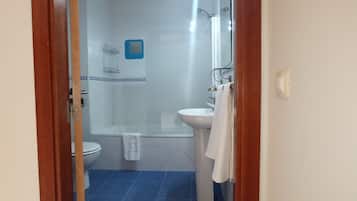 Hair dryer, bidet, towels, soap