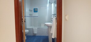 Hair dryer, bidet, towels, soap