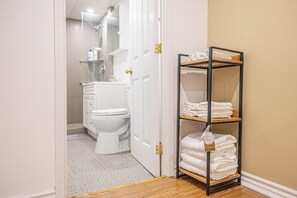 Shower, hair dryer, towels, soap