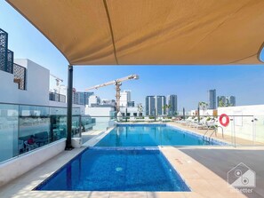 Pool - Rokane G25 Studio – Modern Comfort with City Views (Dubai)
