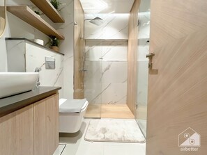 Shower, towels - Rokane G25 Studio – Modern Comfort with City Views (Dubai)