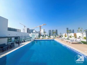 Pool - Rokane G25 Studio – Modern Comfort with City Views (Dubai)