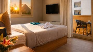 Basic Room (Pyramids View) | Minibar, individually decorated, individually furnished