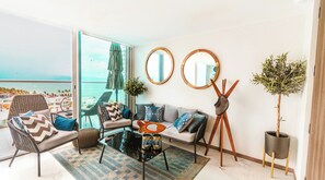 Condo, vue sur l’océan | Salle de séjour | Téléviseur à écran plat