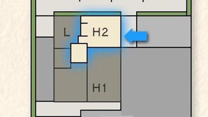 En hotellplan med numrerade rum, A1 till A4, och korridorer, H1 och H2.