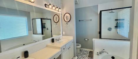 Jetted tub, hair dryer, towels, soap