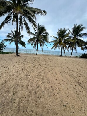 On the beach, sun loungers, beach towels