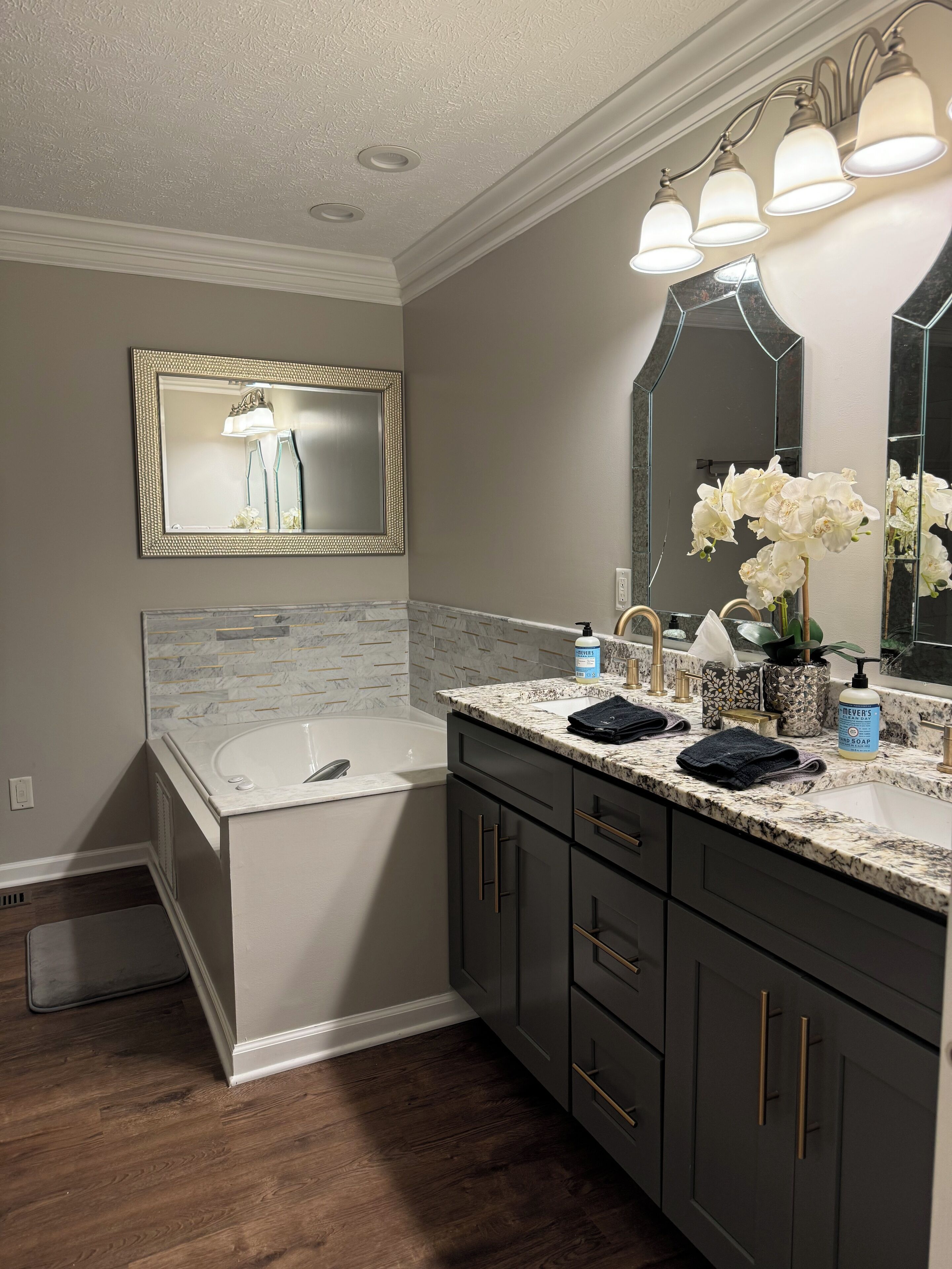 Jetted tub, hair dryer, towels, toilet paper