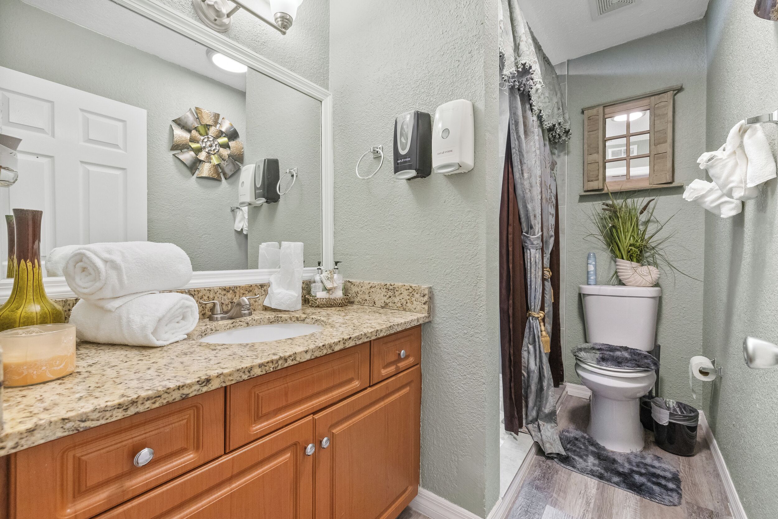 Shower, towels, soap, toilet paper