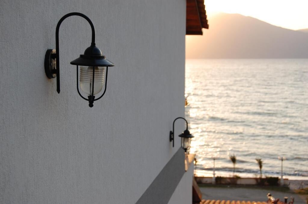 Chambre Triple Confort, vue plage | Terrasse/Patio