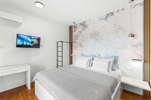 4 slaapkamers, een strijkplank/strijkijzer, gratis wifi, beddengoed