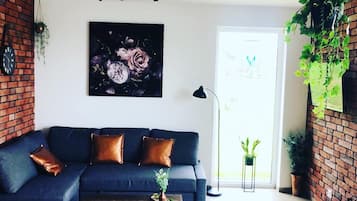 Comfort Chalet | Living area | Flat-screen TV