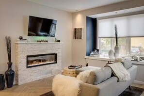 Smart TV, fireplace, music library, video library