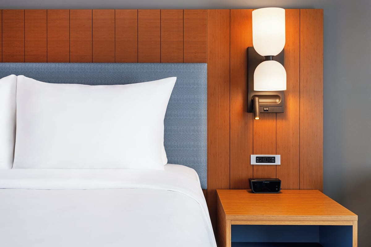 Frette Italian sheets, premium bedding, down duvets, memory-foam beds