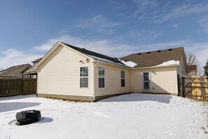A single-story house with a gabled roof and a covered patio area. - "The Dawning House" - Peaceful Modern Stay w/ Yard (Georgetown)