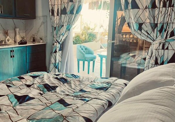 Economy-Studio, 1 King-Bett, Nichtraucher, Kochnische | Bettwäsche aus ägyptischer Baumwolle, hochwertige Bettwaren, Minibar