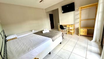 Deluxe Triple Room, Balcony, Mountain View | Minibar, desk, laptop workspace, free WiFi