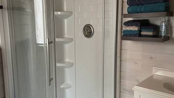 Shower, towels, toilet paper
