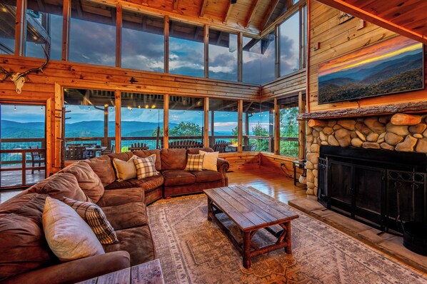 Smart TV, fireplace, books, computer monitors