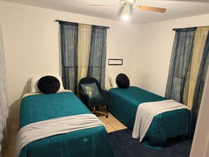 2 habitaciones y ropa de cama