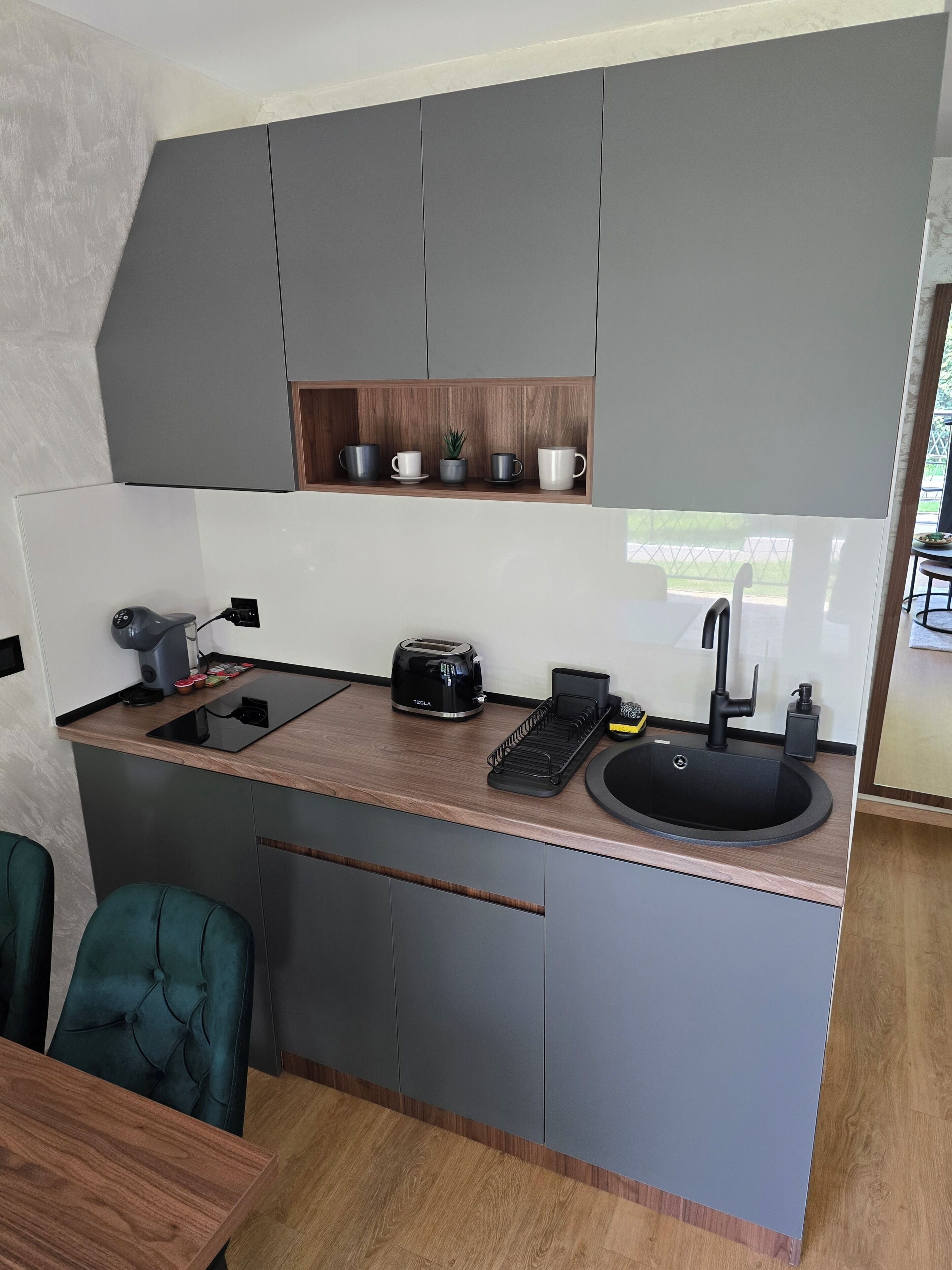 Fridge, coffee/tea maker, toaster, cookware/dishes/utensils