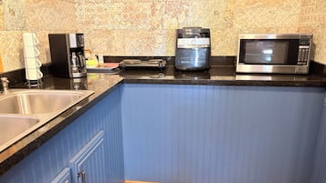 Fridge, microwave, stovetop, coffee/tea maker