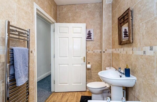 Hair dryer, towels, soap, toilet paper