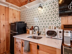 Fridge, microwave, coffee/tea maker, toaster