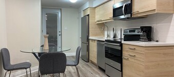 Modernized, Sleek & Cozy Suite, Streestville