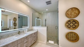 Shower, hair dryer, towels, shampoo