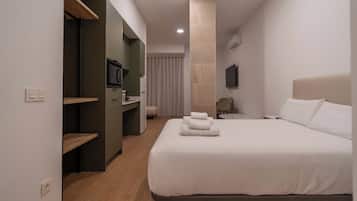 Een strijkplank/strijkijzer, reisbedje, gratis wifi, beddengoed